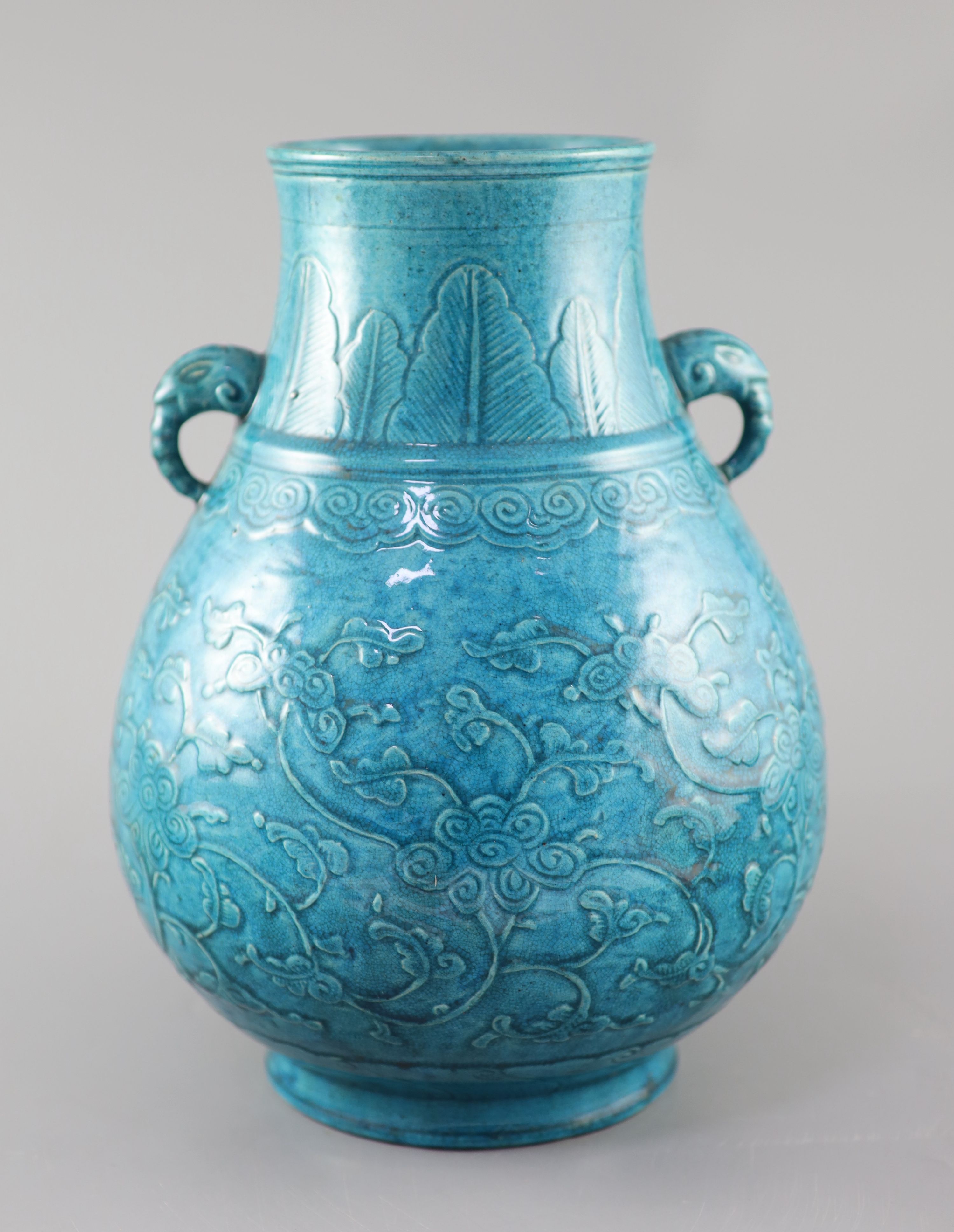 A Chinese turquoise glazed vase, Hu, late Qing dynasty, 31cm high. overall height 41cm.